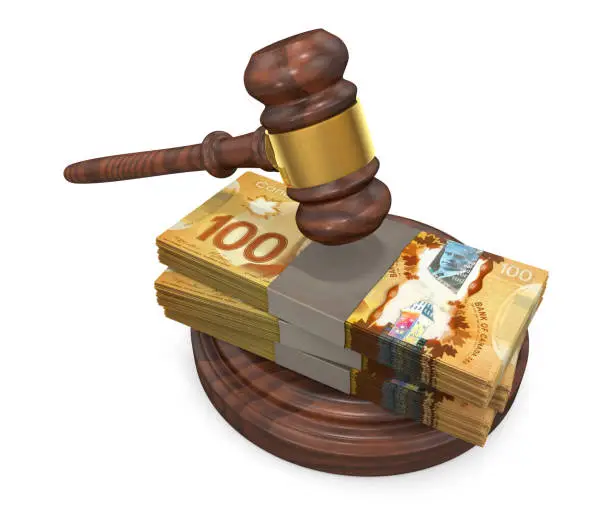 Photo of Judge gavel and stack of Canadian Dollar bills