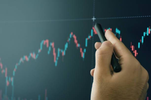 istock Stock market and cryptocurrency trader analyzing data on the computer monitor 1353681824