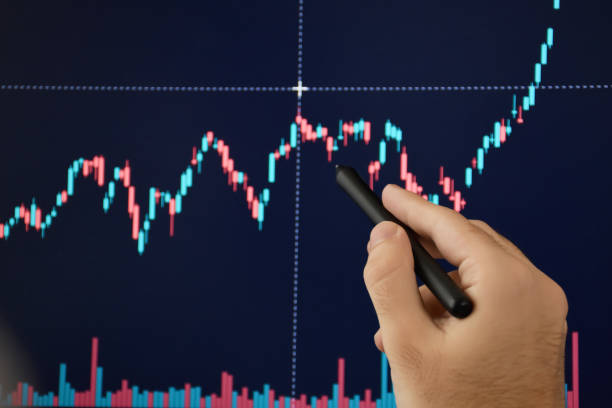 istock Stock market and cryptocurrency trader analyzing data on the computer monitor 1353682451