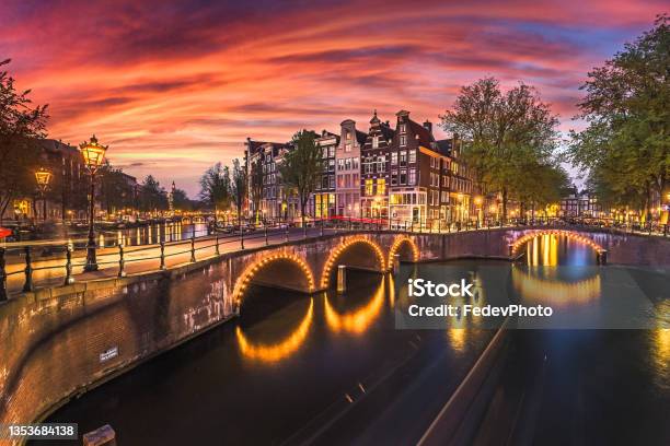 Beautiful View Of Amsterdam Canals With Bridge And Typical Dutch Houses Holland View Of Keizersgracht And Famous Touristic Place Stock Photo - Download Image Now