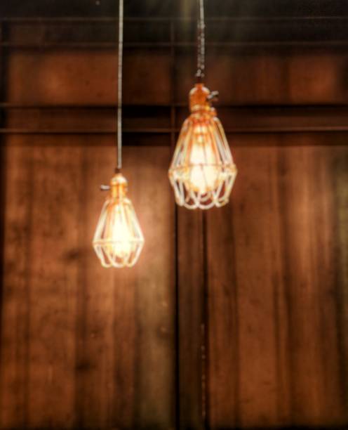 istock De focused background of vintage industrial cage light 1353686837