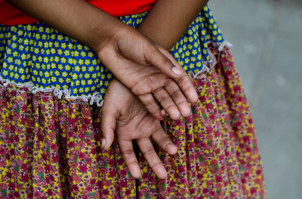 istock Women and young people dancing the samba de roda. 1353687750