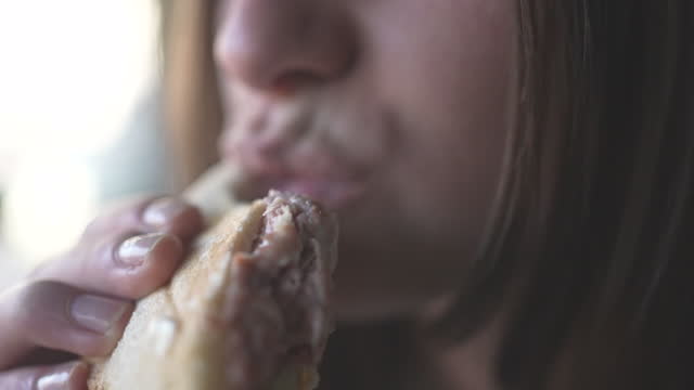 Female Beauty Chewing Delightful Toast In Slow Motion Video