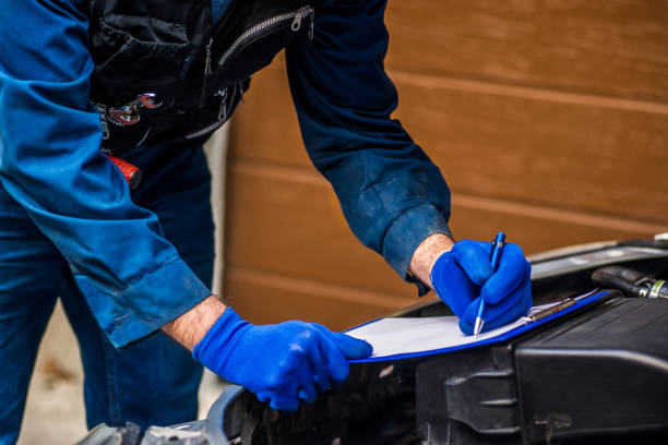 istock Car mechanic analyzes a car breakdown stock photo 1353690597