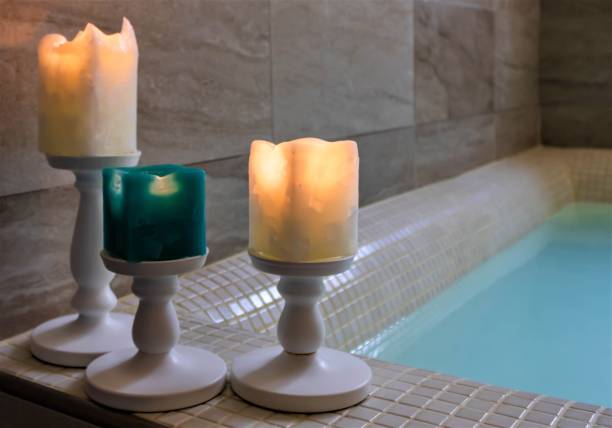 istock Scented candles next to a tub 1353691632