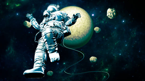 istock Astronaut floating in space. New worlds and unexplored galaxies. Asteroids and planets 1353692344