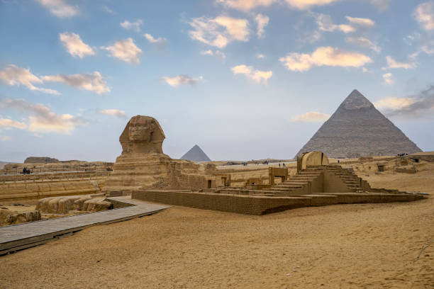 istock Sphinx and pyramids in the Giza necropolis. 1353693941