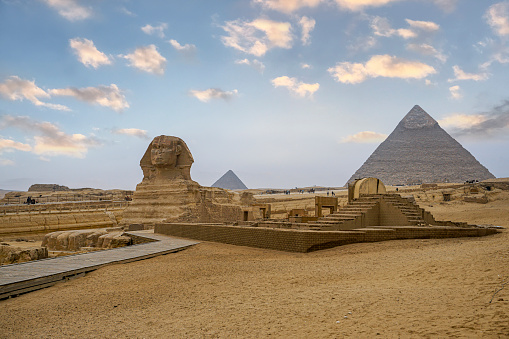 Sphinx and pyramids in the Giza necropolis.