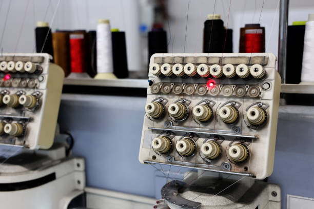 istock Sewing machine in factory 1353693978