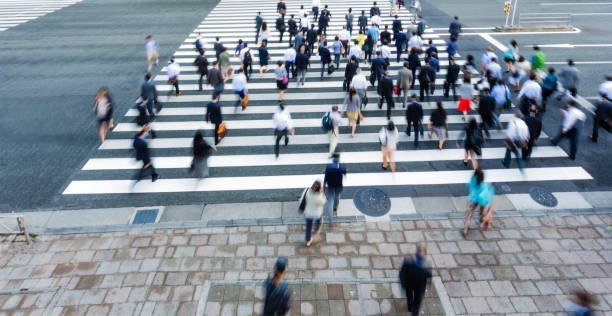 istock Tokyo Crosswalk Scene With Blur Motion 1353699512