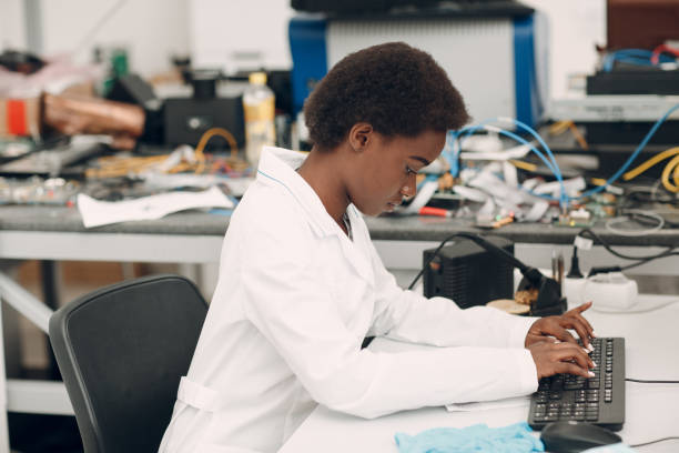 istock Scientist african american woman working in laboratory with electronic instruments 1353699578