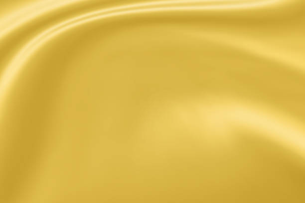 istock Abstract luxury gold fabric with soft wave texture background 1353699691