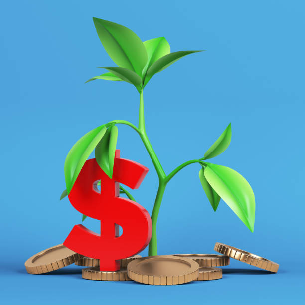 istock Sapling plant gold-colored coins and red-colored Dollar-symbol. 1353705725