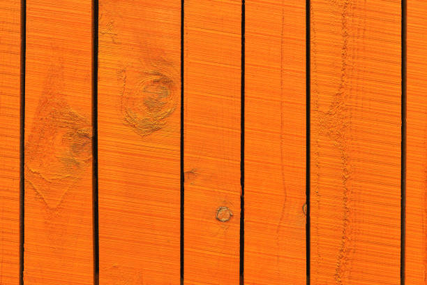Bright orange wooden background. Abstract background. Top view, copy space for text