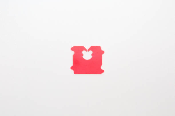 Red Plastic for sealing bread bags on white background