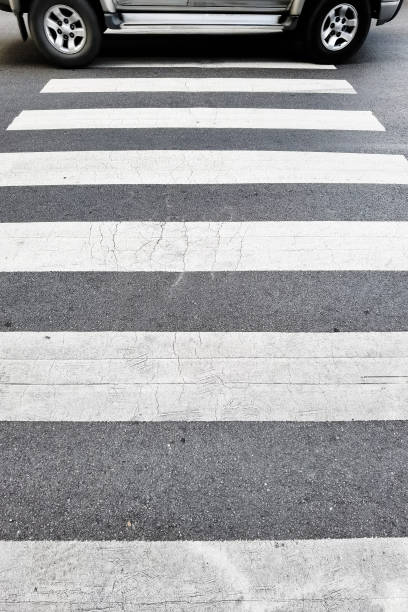 istock crosswalk on the road 1353725073