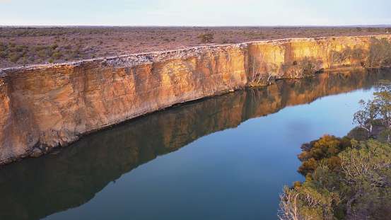 aerial shot of cliffs and the murray river at big bend in south australia