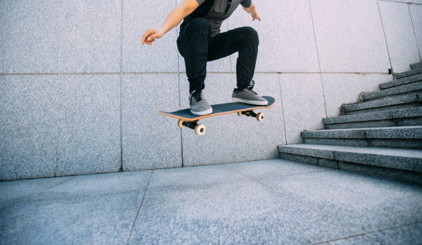 istock Skateboarder skateboarding outdoors in city 1353727594