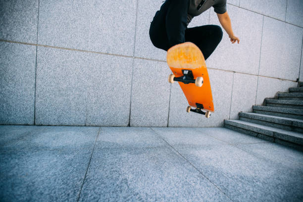 istock Skateboarder skateboarding outdoors in city 1353727614