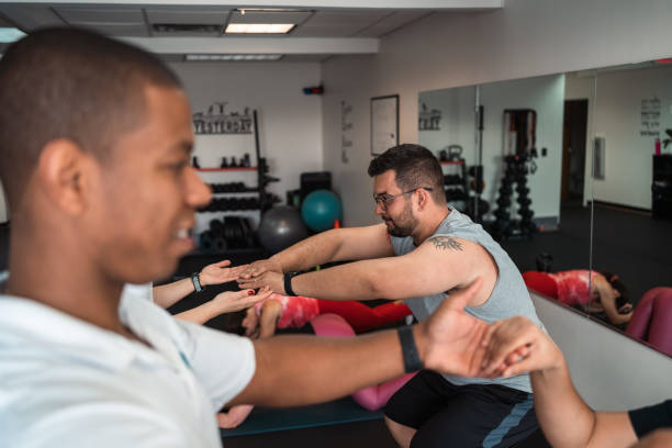 istock People working out in the gym 1353730395