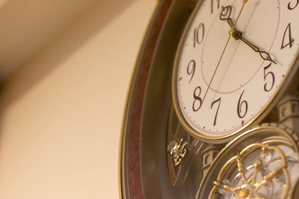 istock Clock hung on the wall of the room 1353730638