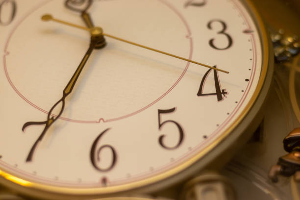 istock Face and hands of the retro clock 1353730639