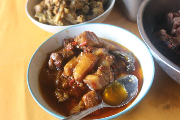 istock Processed meat with Indonesian specialties and spices that are cooked traditionally with firewood 1353733246
