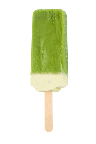 istock Green ice cream popsicle isolated on white background 1353735237