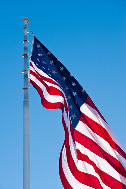 istock American Flag and Blue Sky 135373541