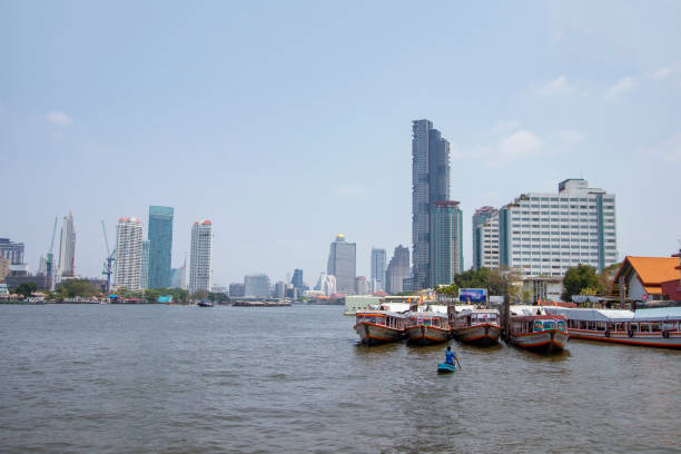 istock Passenger boats on the Chao Phraya River along with beautiful scenery 1353736321