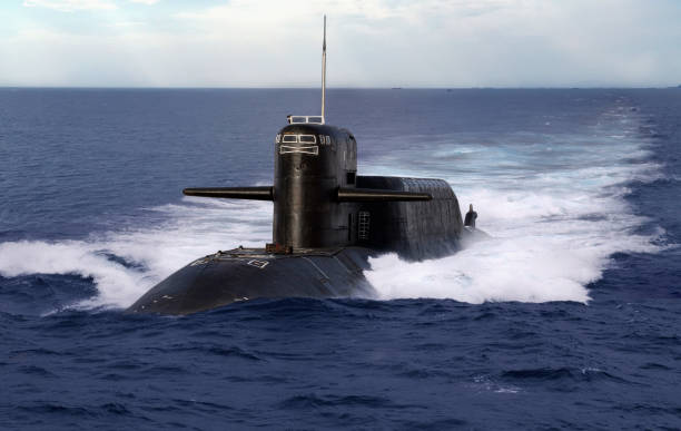 Navel nuclear submarine Navel nuclear submarine cruising on open sea submarine photos stock pictures, royalty-free photos & images
