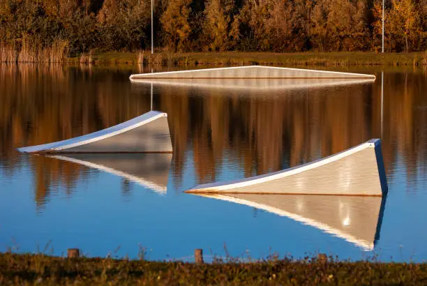 Photo of Wake board park in autumn. Outdoor and extreme sport