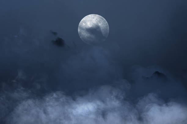 istock Full moon with dark cloudscapes on the night 1353742430