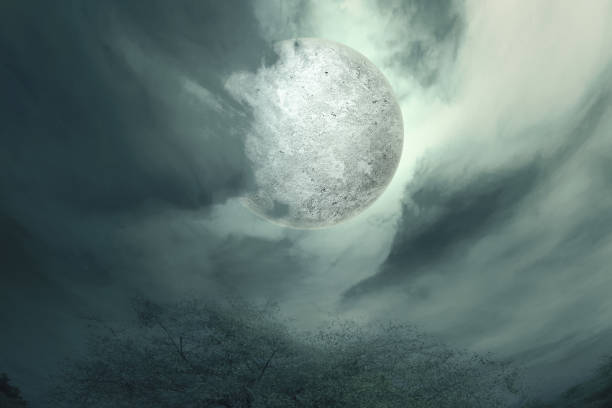 istock Full moon with dark cloudscapes on the night 1353742437