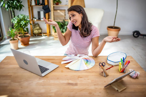 istock Young woman working from home office 1353743797