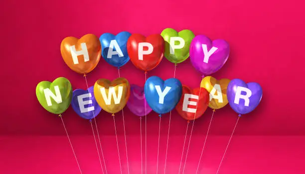 Colorful happy new year heart shape balloons on a pink concrete background. Horizontal banner. 3D illustration render
