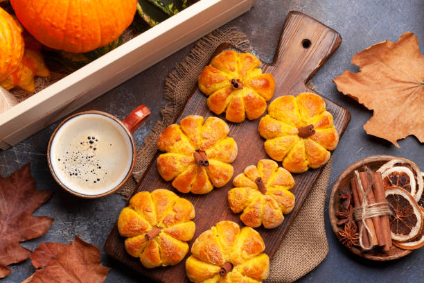 istock Pumpkin muffins and various pumpkins 1353745796