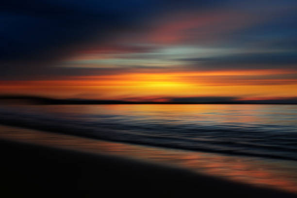 istock Beautiful sunset over a lake 1353748663