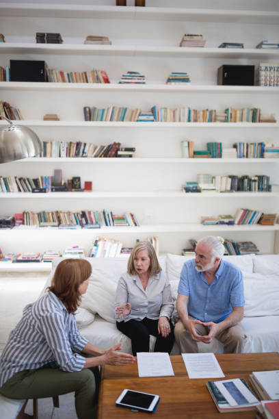 istock Senior couple buying a house 1353749944