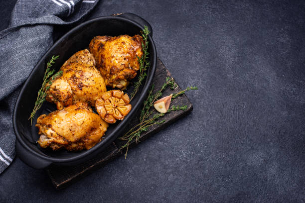 istock Grilled chicken thighs with garlic 1353751271