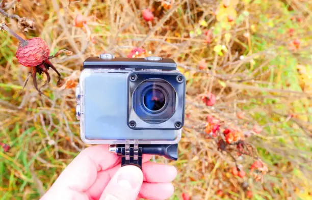 Action-camera for shooting nature and objects. Compact camera for shooting objects.