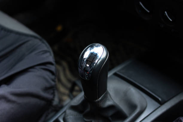 istock Gearbox knob in car close up in shadow 1353757466