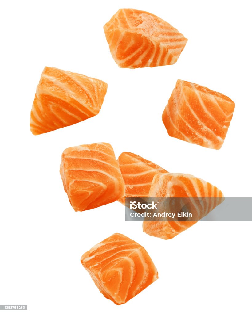 Falling raw salmon, fish isolated on white background, clipping path, full depth of field Salmon - Seafood Stock Photo