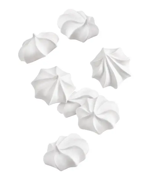 Falling meringue, zephyr, marshmallow, isolated on white background, clipping path, full depth of field