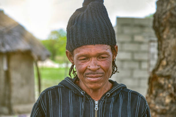 istock African man with a beanie and braids in his yard 1353758783