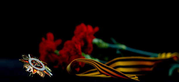 9th May. Victory Day. Guards ribbon, carnations and Order
