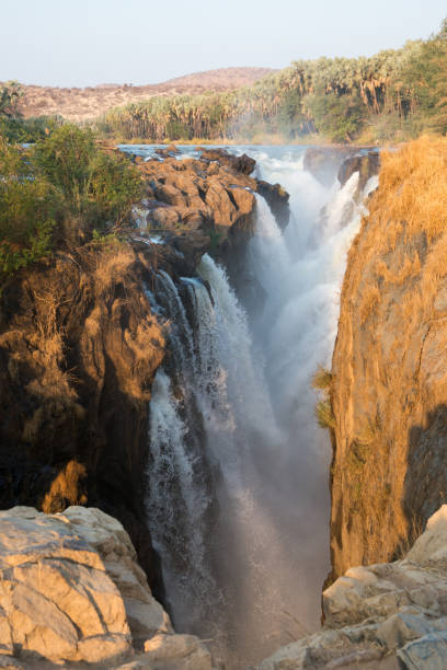 istock Beautiful Epupa falls, with sunset light. Namibia 1353763491