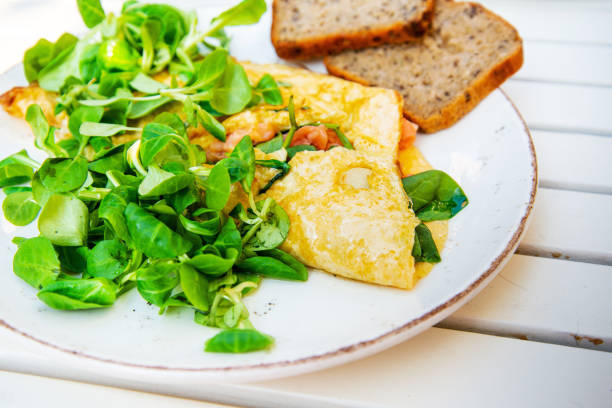 istock French Omelette with Potatoes, Mushroom and Salad 1353765665