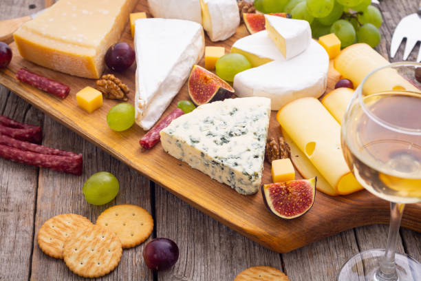 istock Cheese board with fruits and snack 1353765669