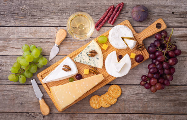 istock Cheese board with fruits and snack 1353765690